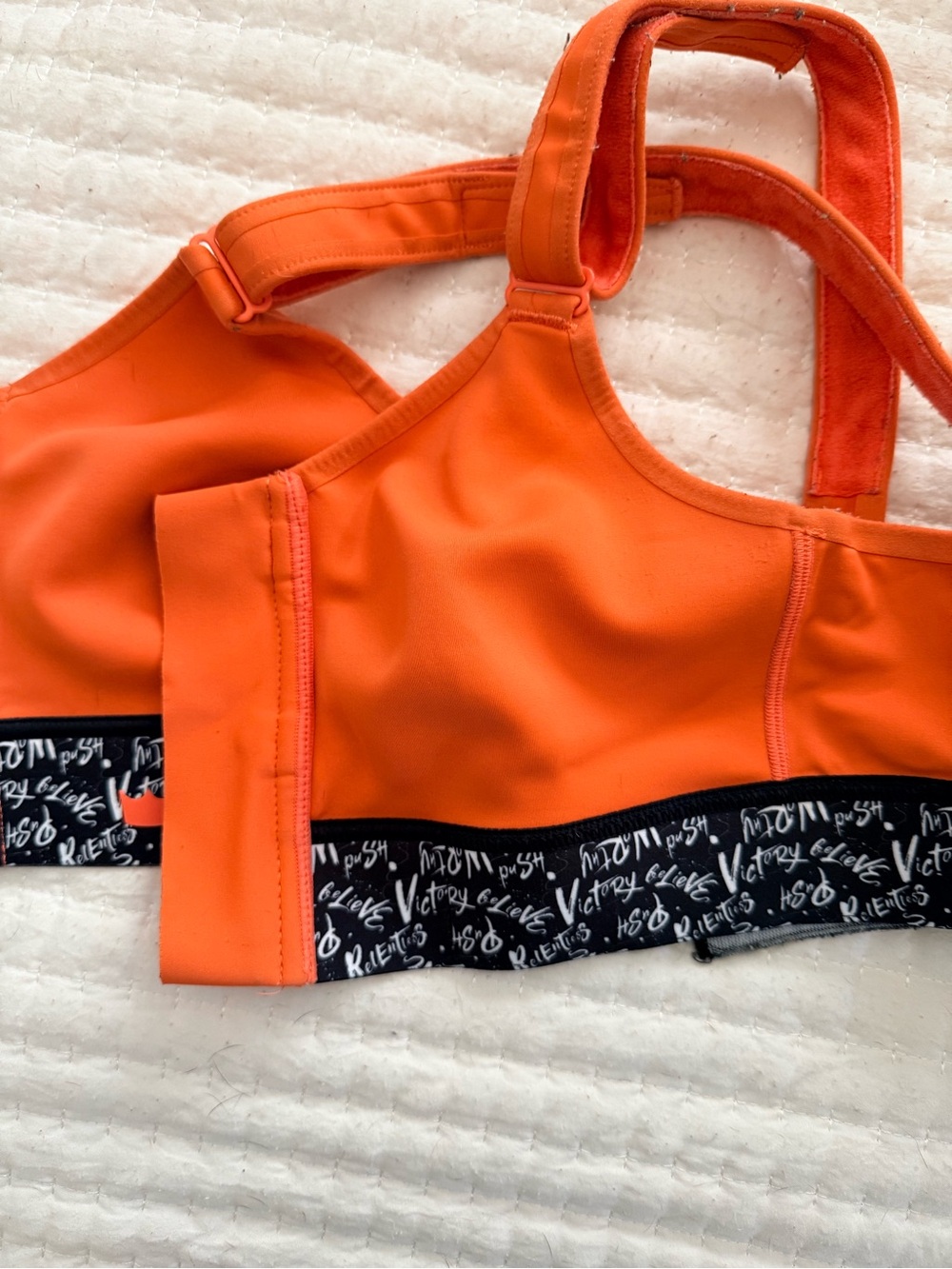 SHEFIT Orange Sports Bra with Black Script Band